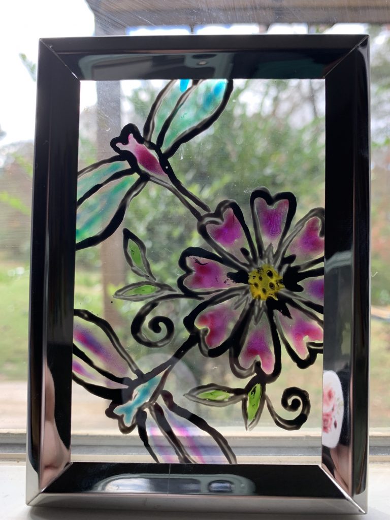 dragonfly and flowers painted stained glass
