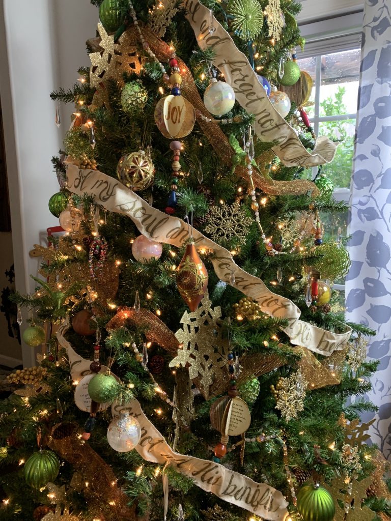 Christmas tree with paper Bible verse ornaments