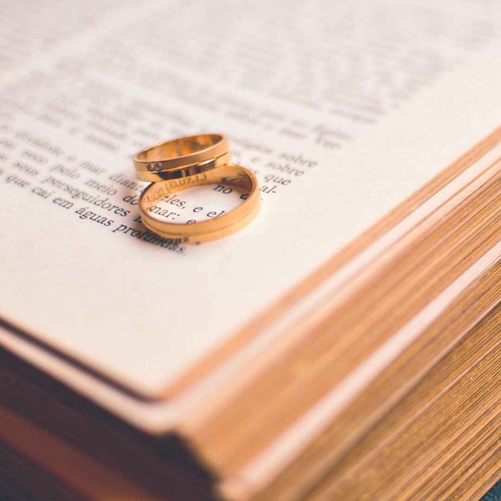 Bible wedding verses 2 rings on the Bible
