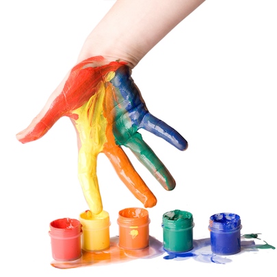 kid's hand in paint
