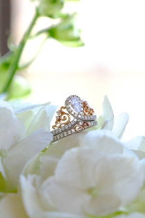 Disney engagement ring on white flowers