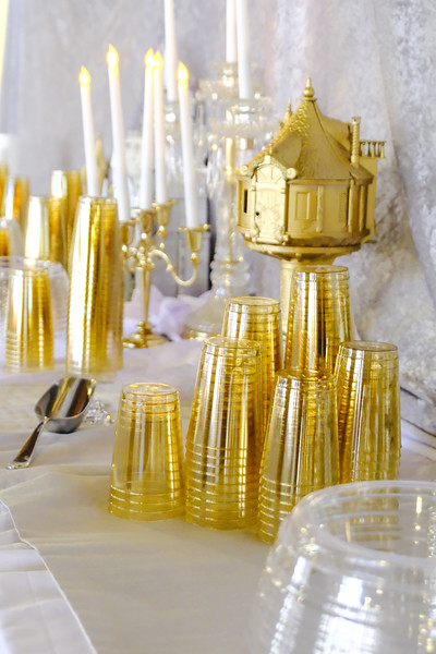 gold and silver Disney castles wedding drink table