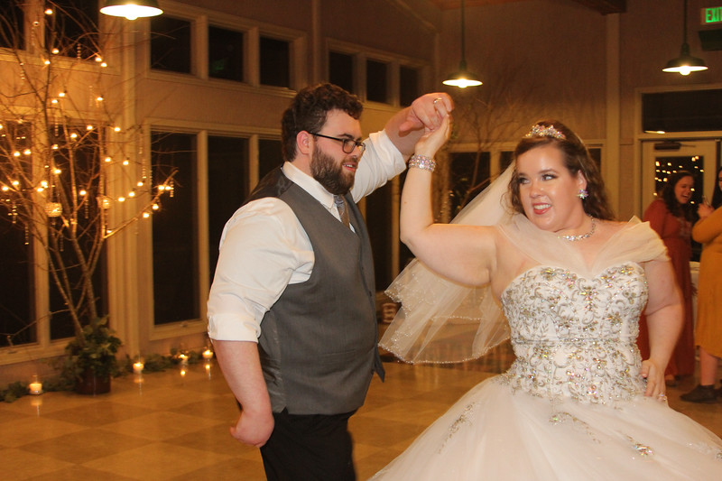 Bride and groom dancing