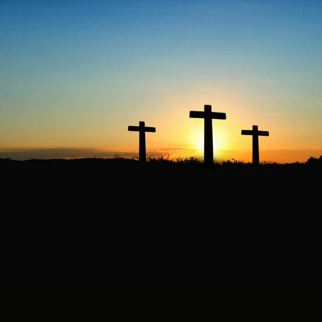 three crosses and sunset