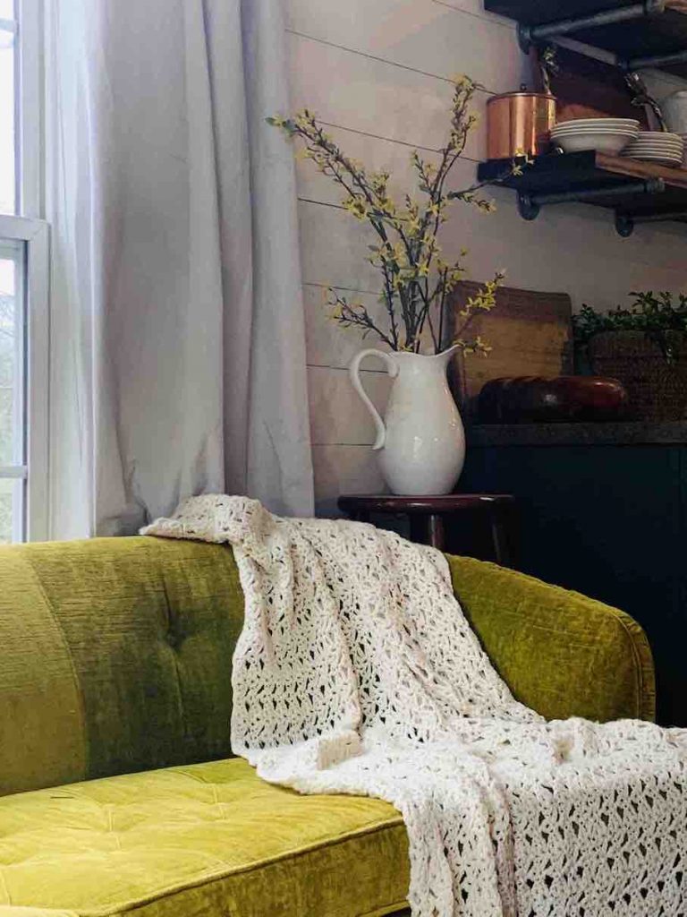green couch and Christ laser cut