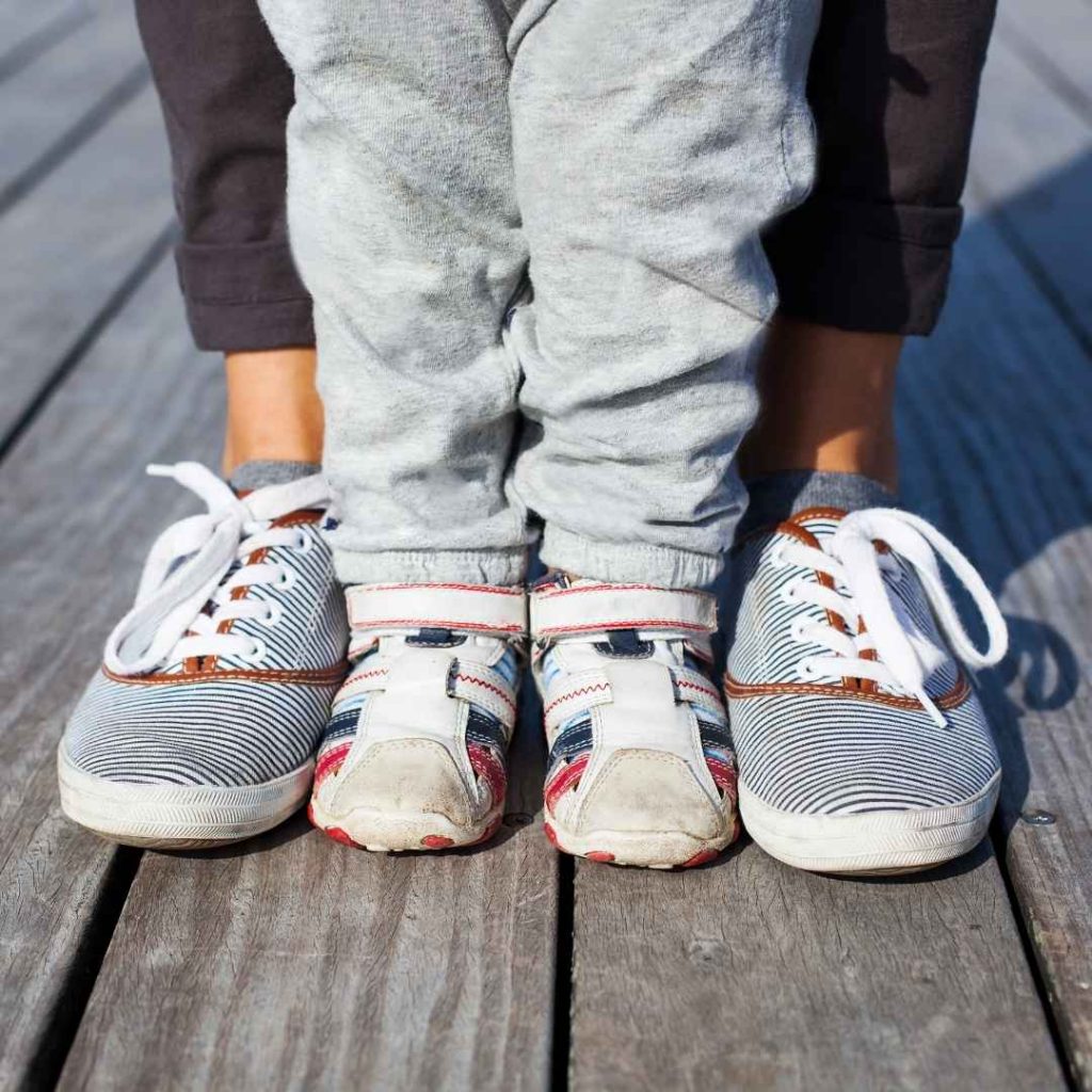 parent and child's shoes together