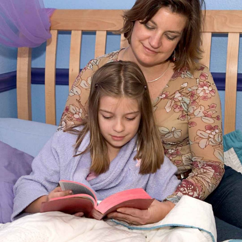 mom and daughter reading the Bible